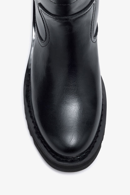 Low Boots in Black Oleatex